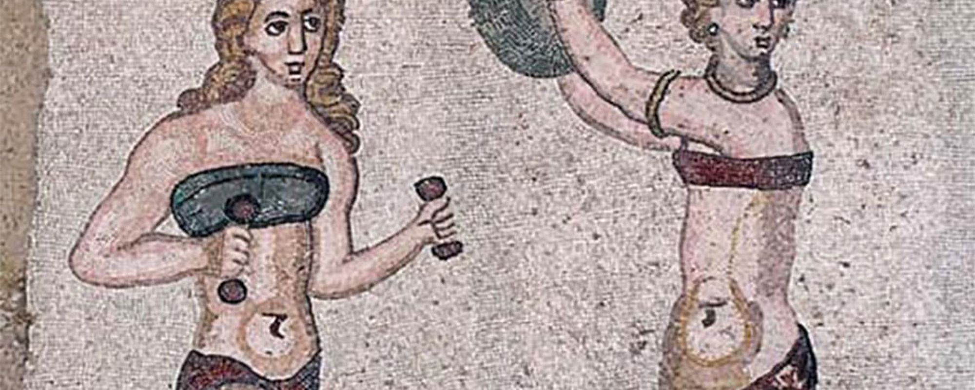 Roman floor mosaic showing a female athlete holding a small hand weight in one hand and a discus in the other