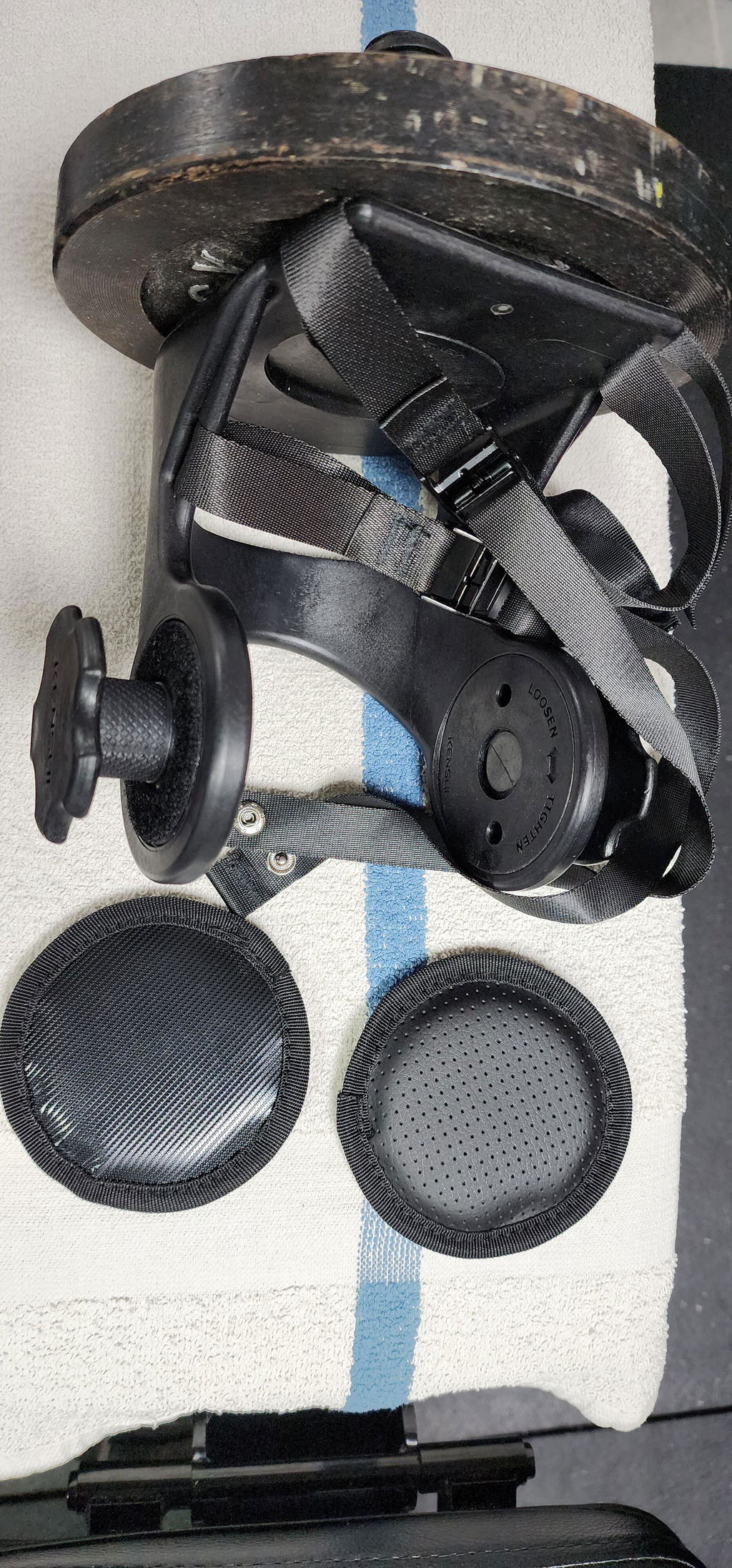 A customer's Kensui EZ-BOOT MAX V2 with a weight plate loaded on the side sleeve and spare plates beside it