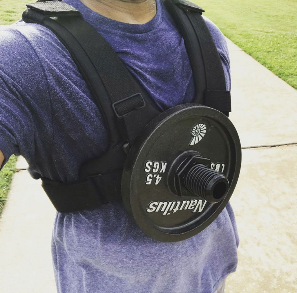 Close view of the vest loaded with a reviewer's own branded plate